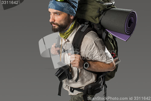 Image of Portrait of a male fully equipped tourist 