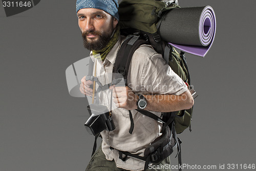 Image of Portrait of a male fully equipped tourist 