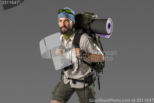 Image of Portrait of a male fully equipped tourist 