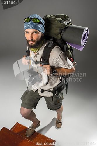 Image of Portrait of a male fully equipped tourist 