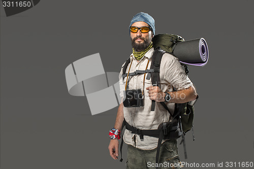 Image of Portrait of a male fully equipped tourist 