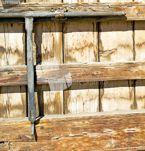 Image of rusty  brown    morocco in africa the old wood  facade home and 