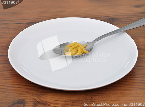 Image of Spoon with mustard