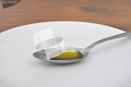 Image of Spoon with olive oil