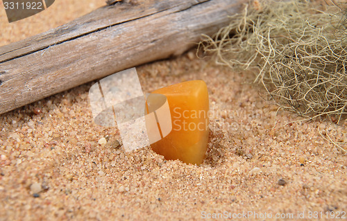 Image of Orange calcite on beach