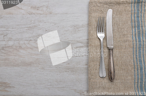 Image of Old cutlery on cloth