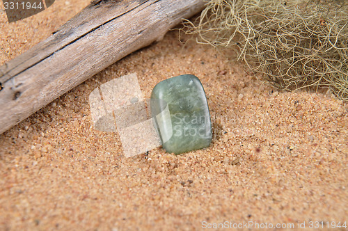 Image of Moss agate on beach