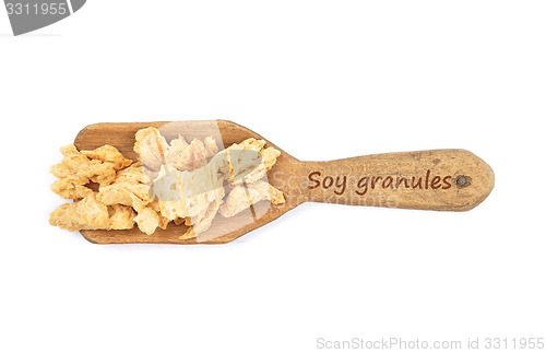 Image of Soy granules on shovel