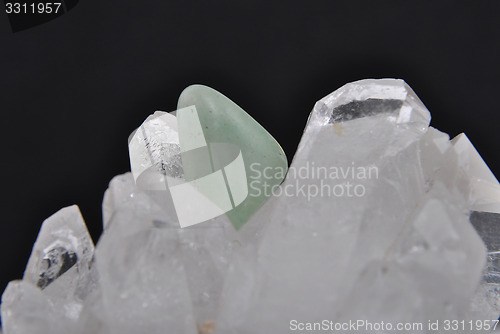 Image of Topaz on rock crystal