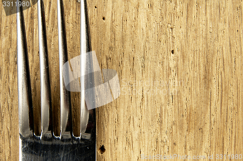 Image of Fork on the kitchen table.