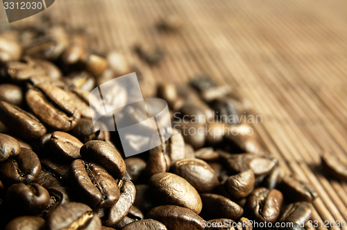 Image of Scattered fresh coffee beans.