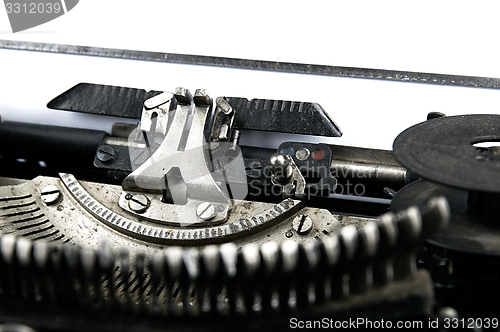 Image of Old, dusty typewriter seen up close.