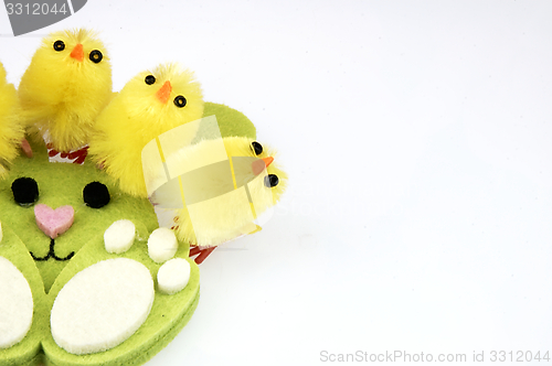 Image of Little yellow chickens. Easter decorations.