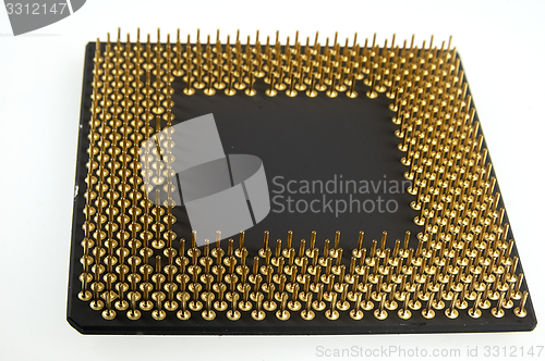 Image of Processor seen from the gold pins on a white background.