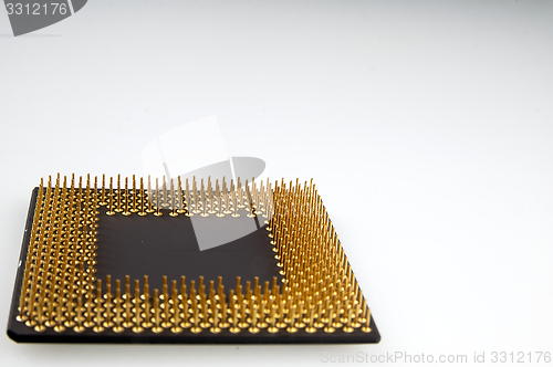 Image of Processor seen from the gold pins on a white background.