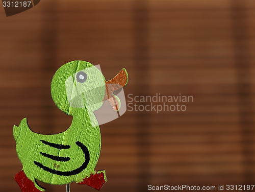 Image of Easter decoration - green wooden duck.