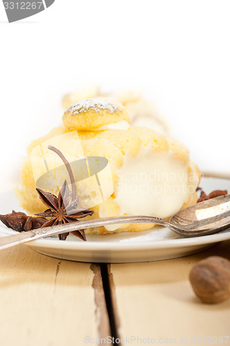 Image of cream roll cake dessert and spices 