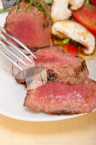 Image of beef filet mignon grilled with vegetables