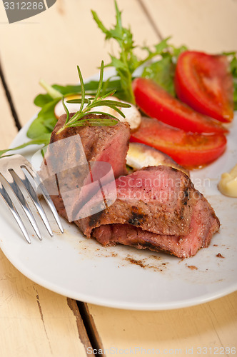 Image of beef filet mignon grilled with vegetables