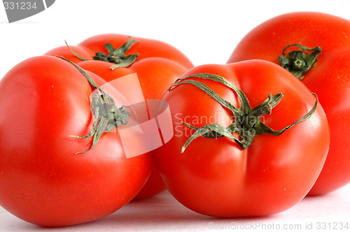 Image of Four fresh tomatoes
