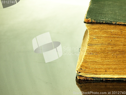 Image of Old closed the book with a damaged cover.