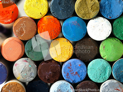 Image of Colored dry pastel crayons closely.