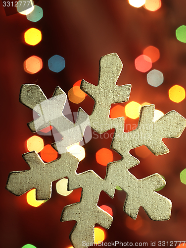 Image of Huge snowflake and magic bokeh.