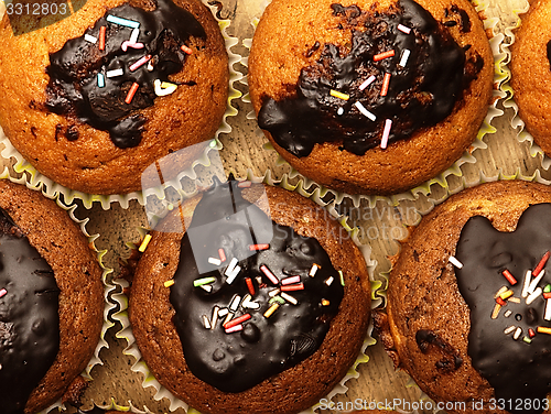 Image of Muffins with chocolate icing.