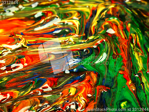 Image of Colored paint mixed on palette.