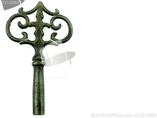 Image of Old metal key on a white background.