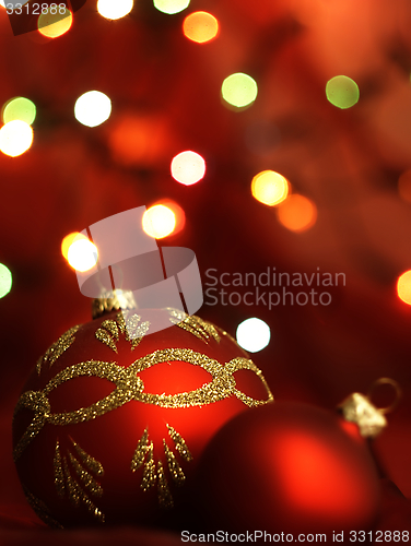 Image of Red Christmas Tree bauble and magic bokeh.