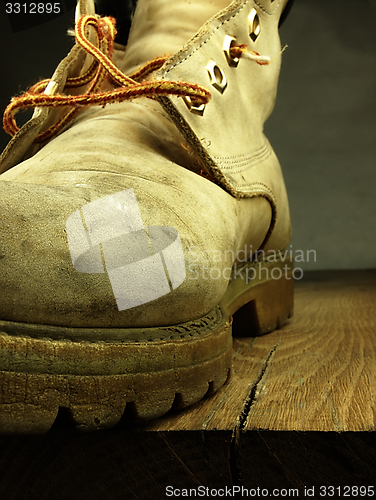Image of Military, heavy shoe on the edge.