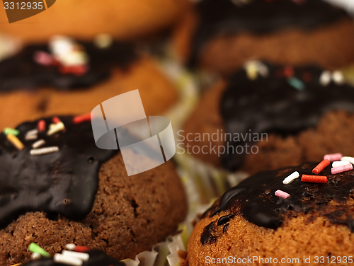 Image of Muffins with chocolate icing.