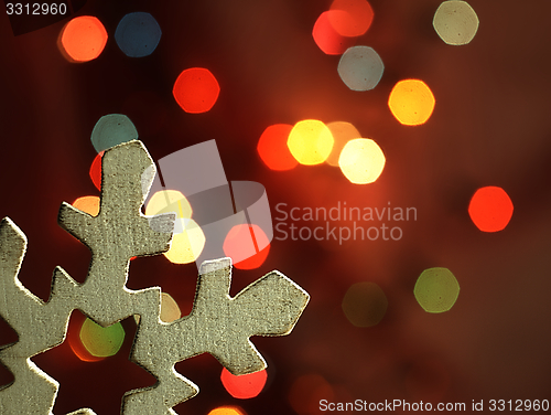 Image of Huge snowflake and magic bokeh.