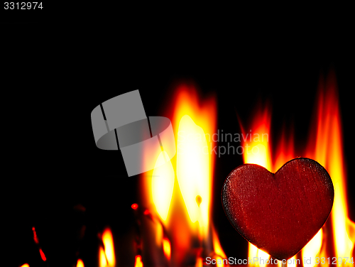 Image of Flaming heart on a black background.