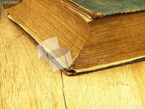 Image of Old closed the book with a damaged cover.