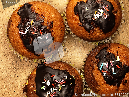 Image of Muffins with chocolate icing.