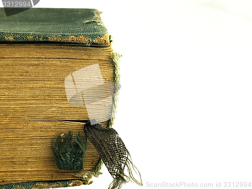 Image of Old closed the book with a damaged cover.