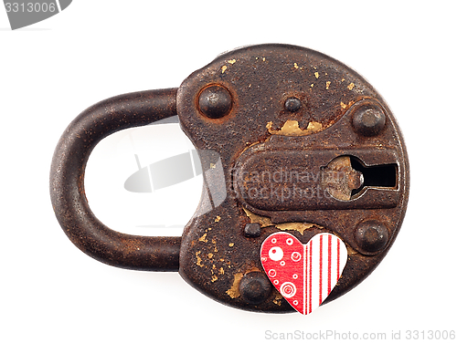 Image of Rusty padlock and heart on a white background.