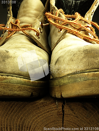 Image of Pair of old, worn heavy boots.