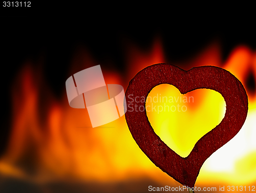 Image of Flaming heart on a black background.