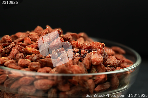 Image of Dried goji berries on the table.