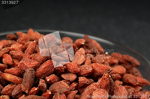 Image of Dried goji berries on the table.