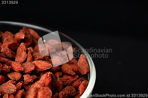 Image of Dried goji berries on the table.