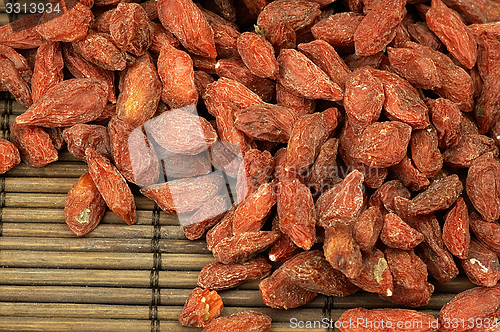 Image of Dried goji berries on the table.