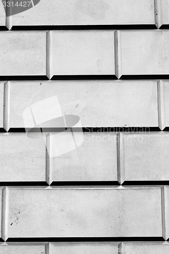 Image of in london abstract    texture of a ancien wall and ruined brick