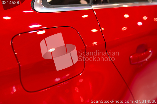 Image of Petrol cap with cover on red car