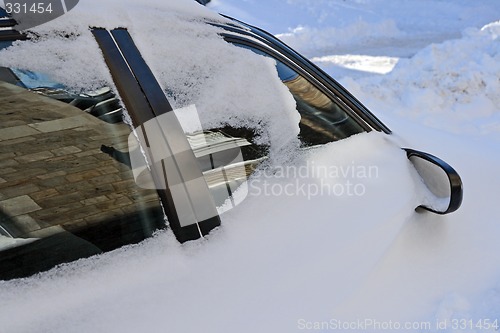 Image of Car stuck in the snowdrift