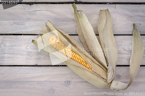 Image of Corn on wooden planks