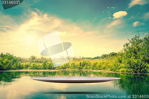Image of Metal stage hovering over a lake